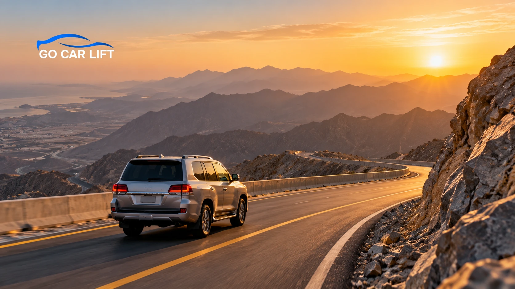 SUV driving on mountain road during a day trip from Dubai to Ras Al Khaimah.